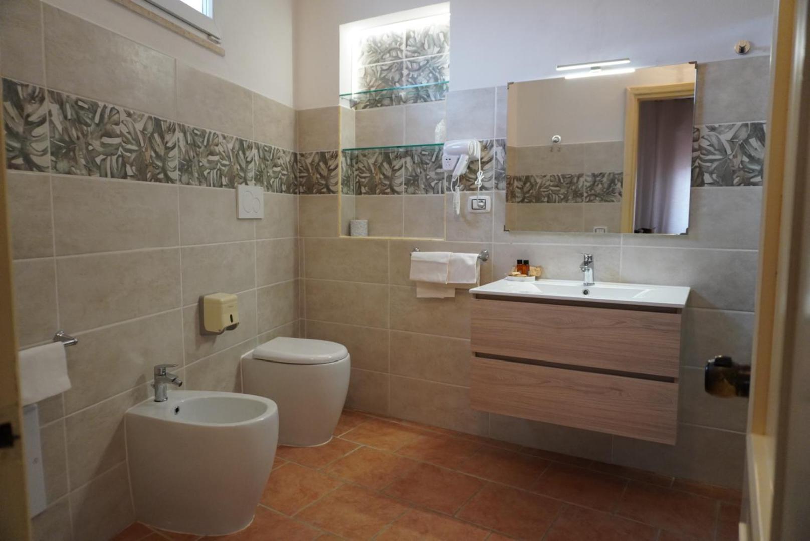 Albergo Ristorante Locanda Rosella Giba Bagian luar foto
